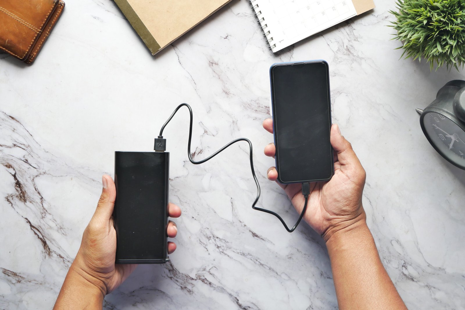 smart phone charging with Power bank top view.
